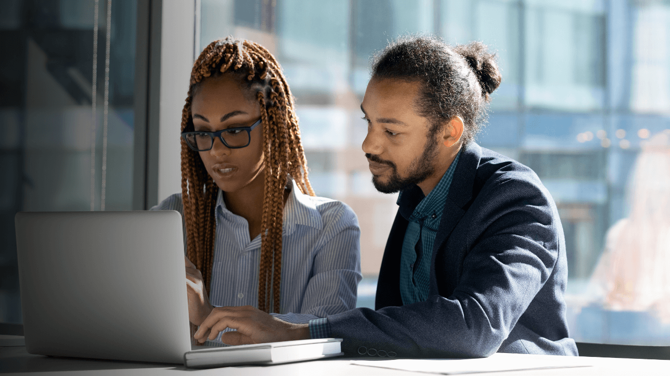 business people work on laptop discuss project together